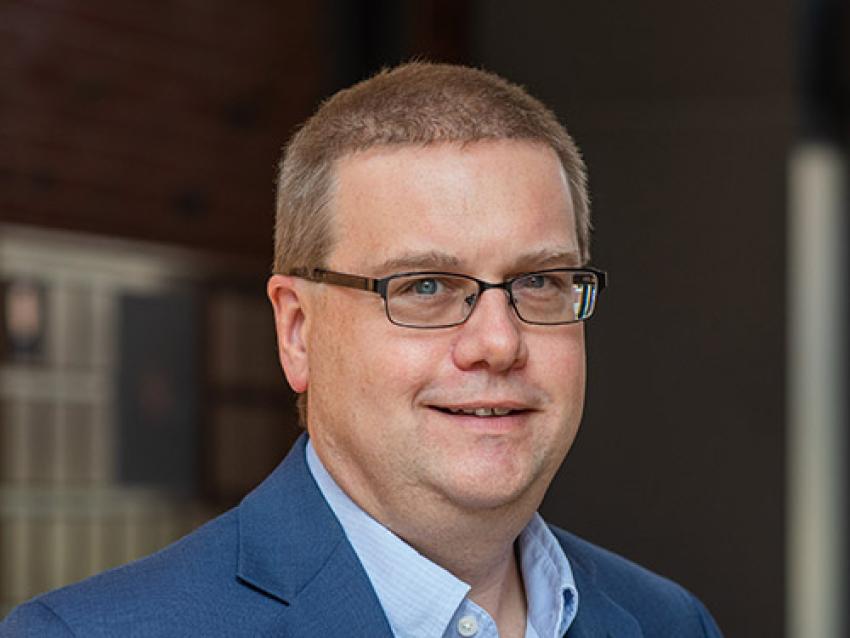 Professional headshot of Mike Renfro.